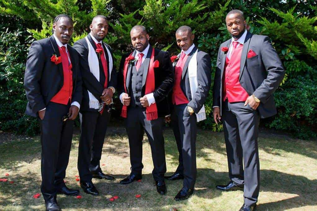 Dinner suits with red accessories