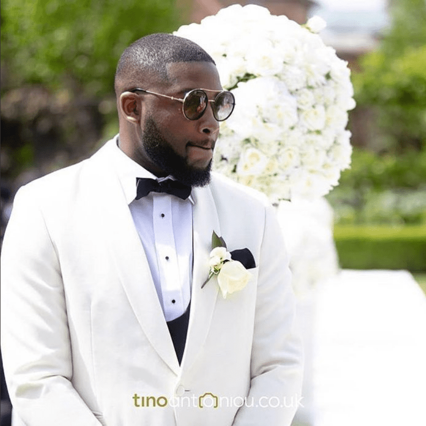 Ivory MTM tuxedo suit worn by one of our Grooms