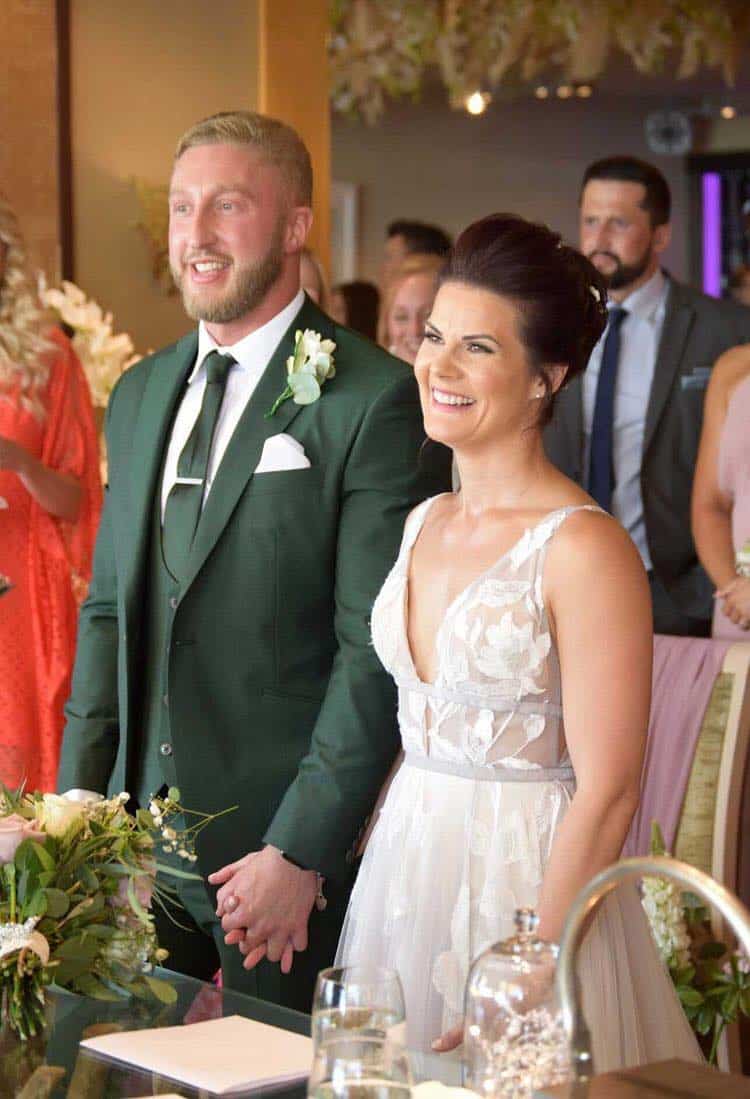 Mr Butt green wedding suit from our made-to-measure collection making this groom stand out

