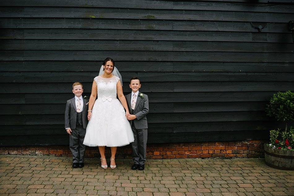Grey lounge suits for these two page boys on their Mum's wedding day