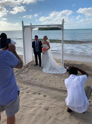 The beach in St Lucia was the setting for Mr Flint's wedding. Choosing to wear our navy lounge hire suit with a contrasting waistcoat