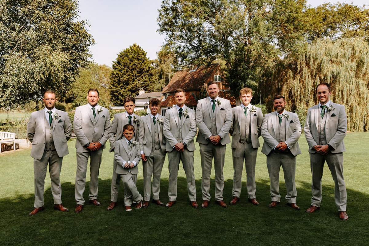 Pete and his groomsmen wore our hire grey lambs wool tweed suits. Photograph by Chris Bradshaw Photography