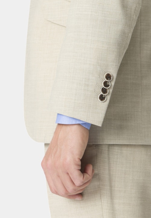 Button detail on ready to wear oatmeal linen mix suit