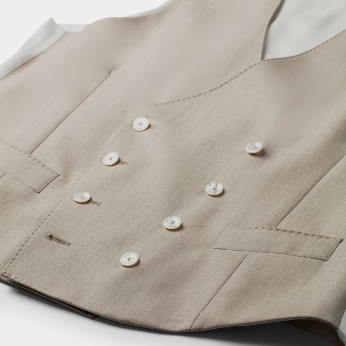 An 8 button double breasted beige waistcoat one of our many made to measure styles available
